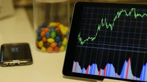 chart-tablet-candies-app-stocks-cryptos